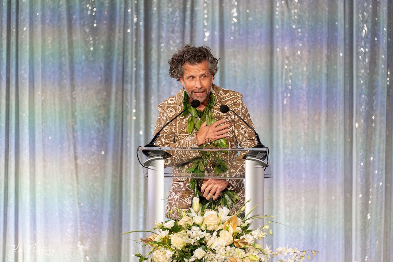 Stephan Boeker speaking at the 2024 Emmy Awards podium